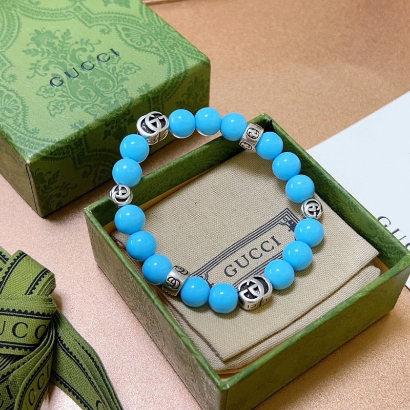 G*u*i bracelets
